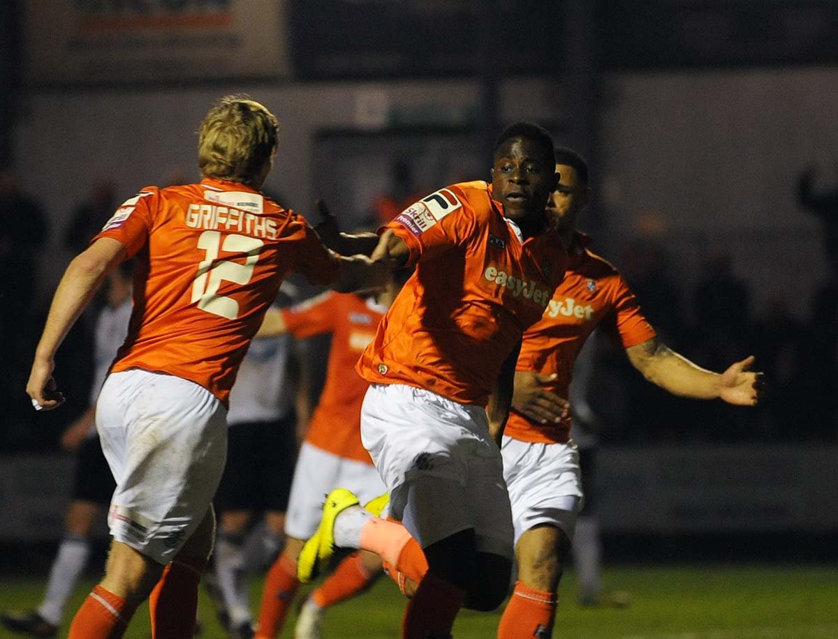 Mpanzu scoring the first of two late Luton Town goals at Dartford in 2014.