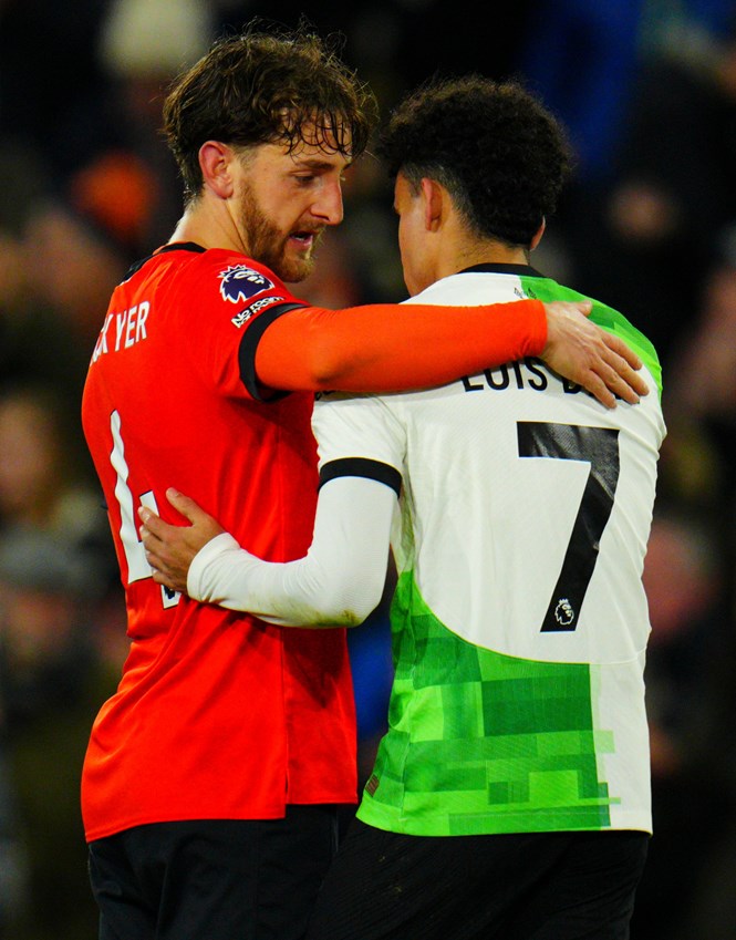 Tom Lockyer consoling Luis Diaz at full-time in November's draw against Liverpool.