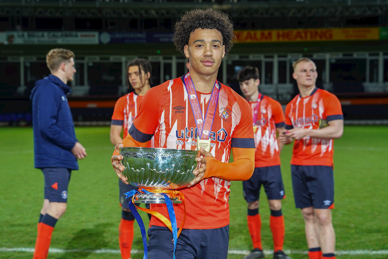 Aidan Francis-Clarke with the Beds Senior Cup trophy.