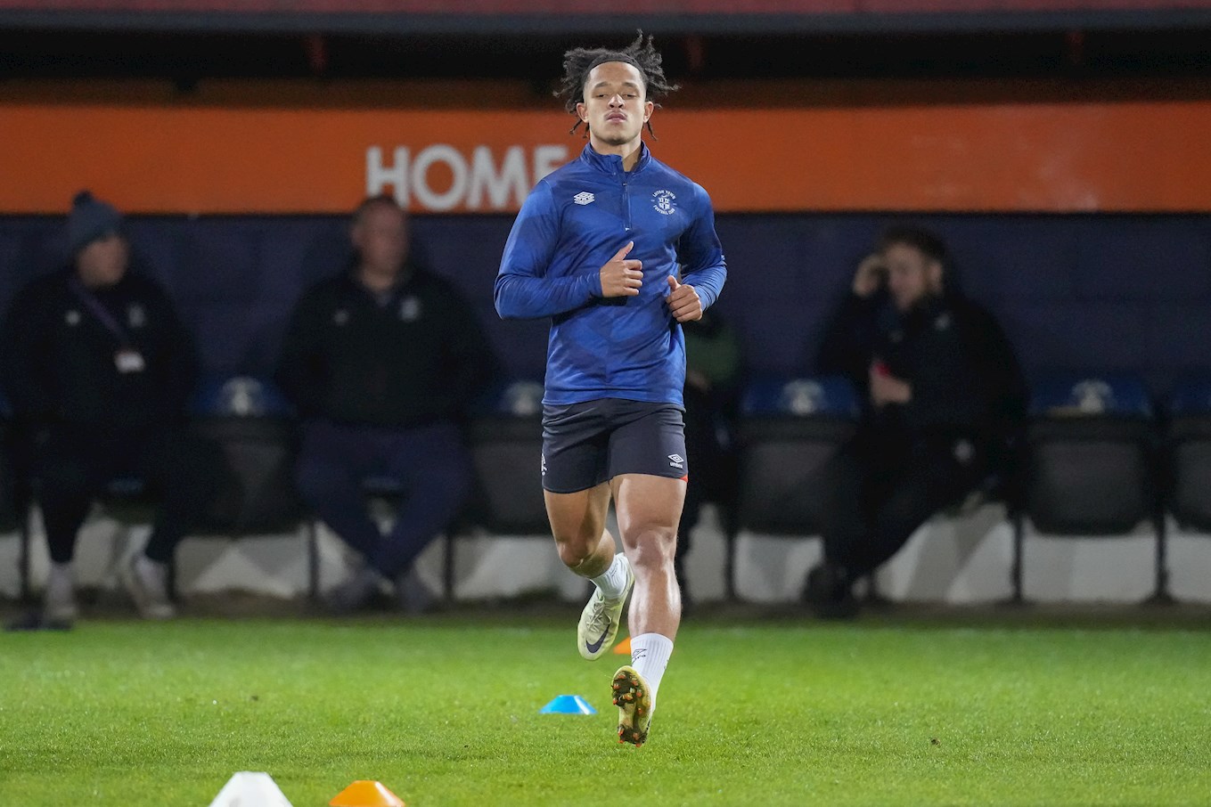Conor Lawless warming up at Kenilworth Road.