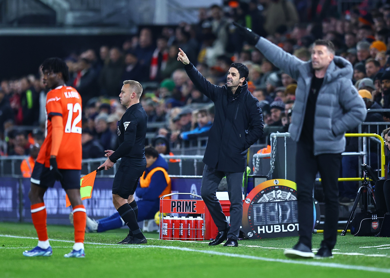 Rob Edwards and Mikel Arteta on the touchline during our game against Arsenal.