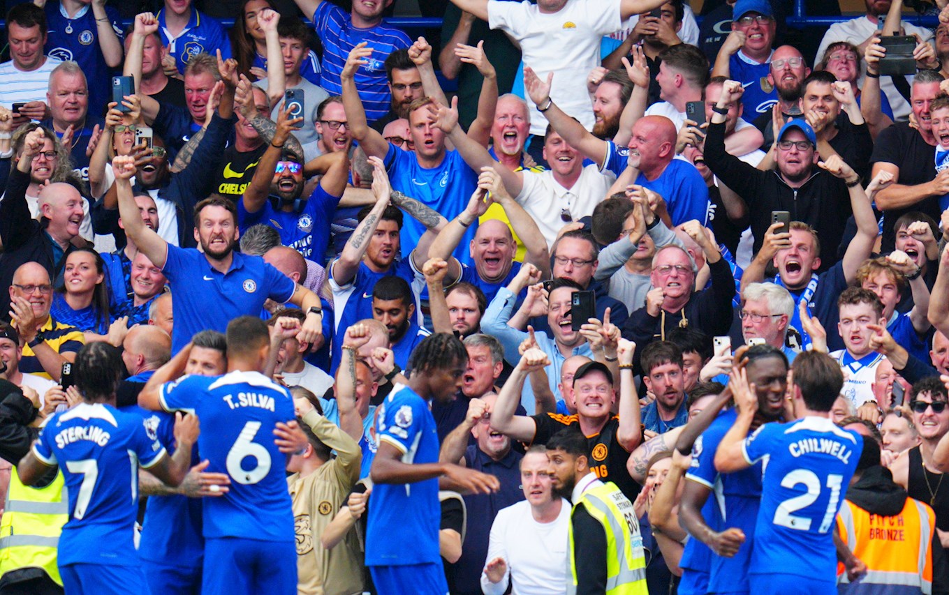 Chelsea players celebrate with their fans after equalising against Liverpool earlier this month.