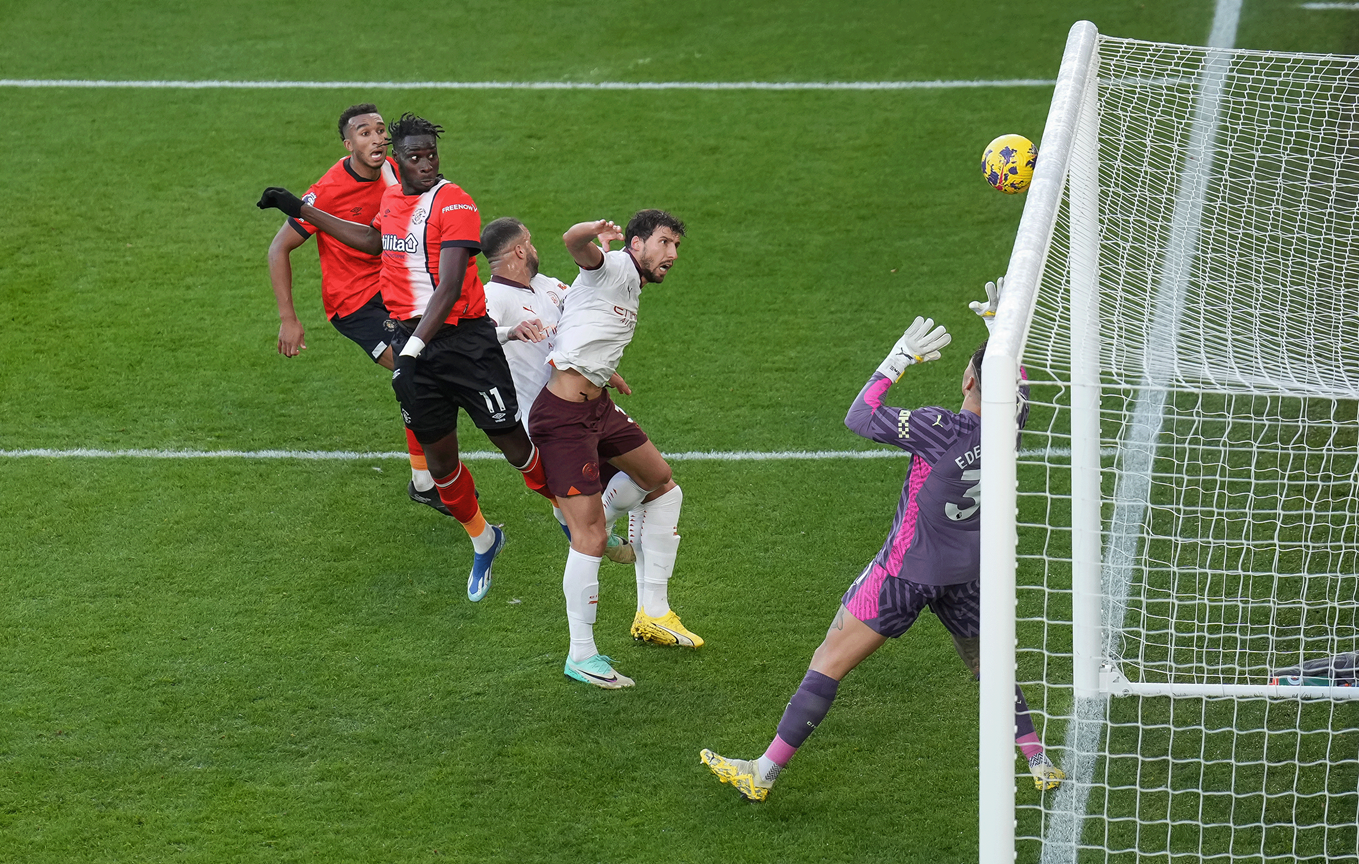 Elijah Adebayo scoring his header against Manchester City.