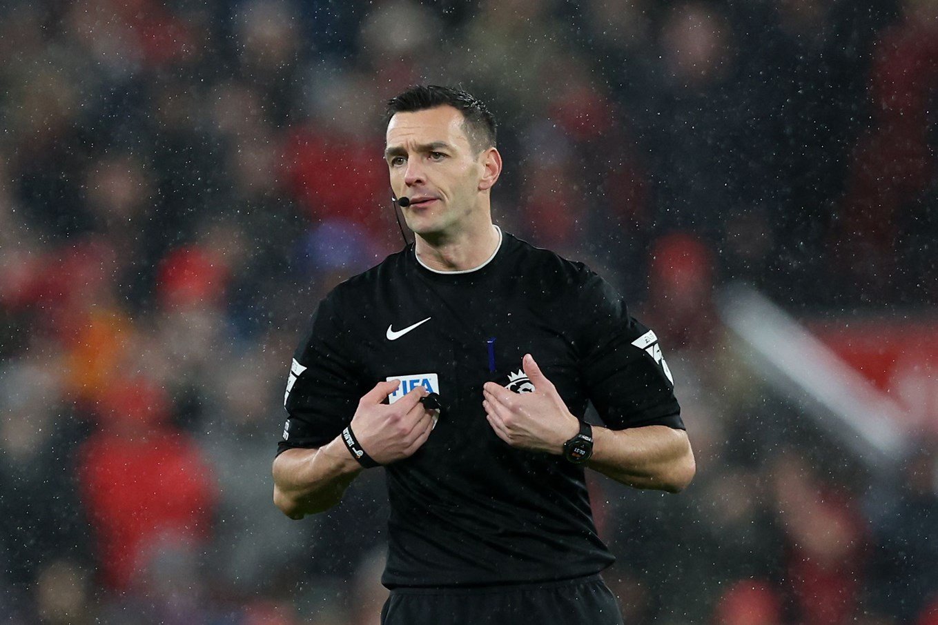 Referee Andy Madley officiating our game at Liverpool.