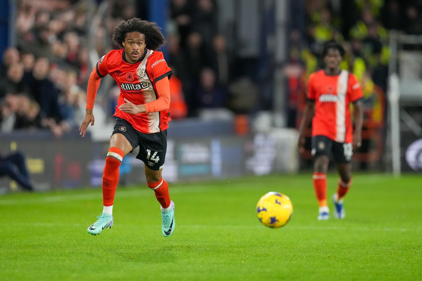 Tahith Chong running with the ball against Liverpool.