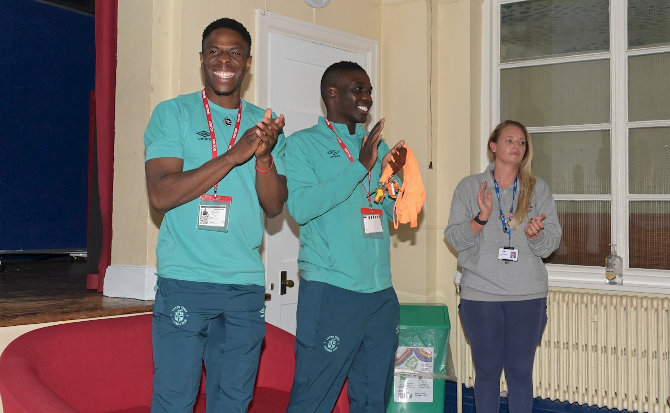 Chiedozie Ogbene and Marvelous Nakamba attend a No Room For Racism event at Stopsley Primary School