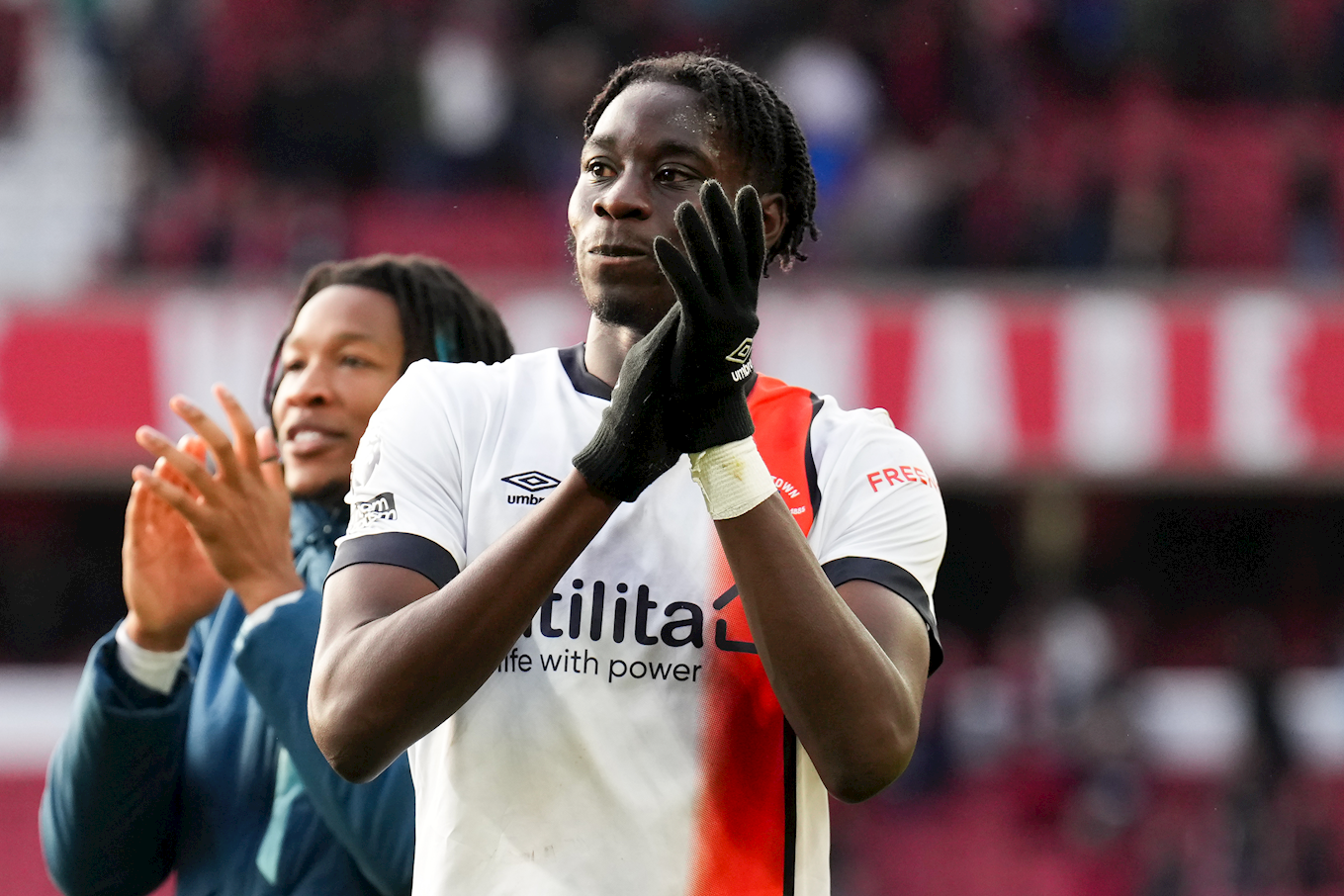 Elijah Adebayo clapping the Luton Town fans at Nottingham Forest.