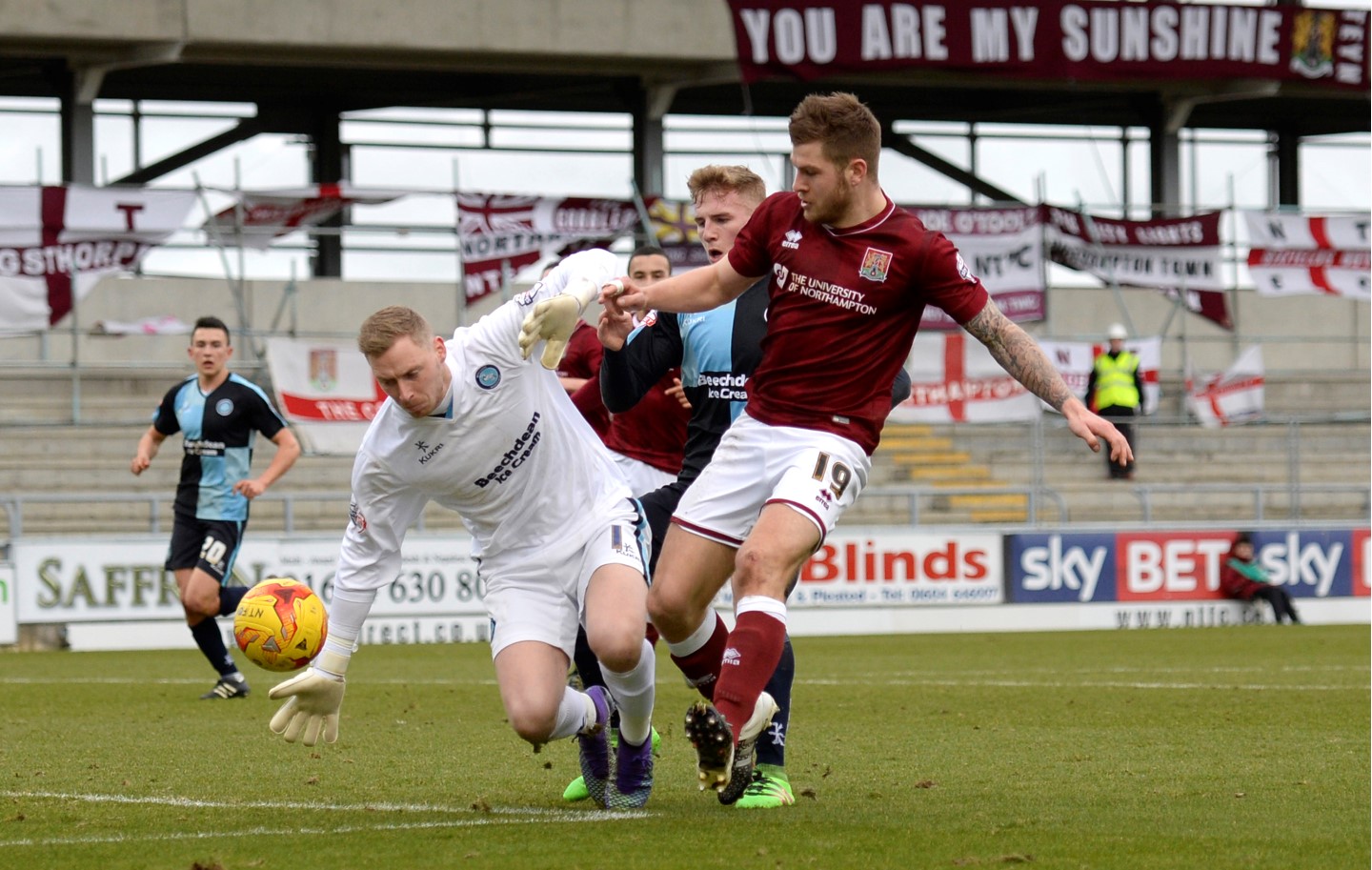 James Collins, right, in action for former club Northampton Town when they won the League Two title in 2015-16