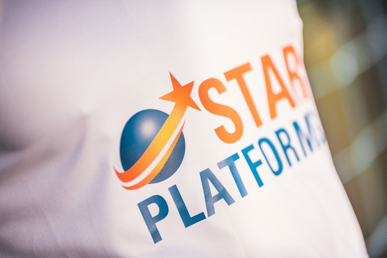 Pelly Ruddock Mpanzu wears the new away shirt sponsored by Star Platforms