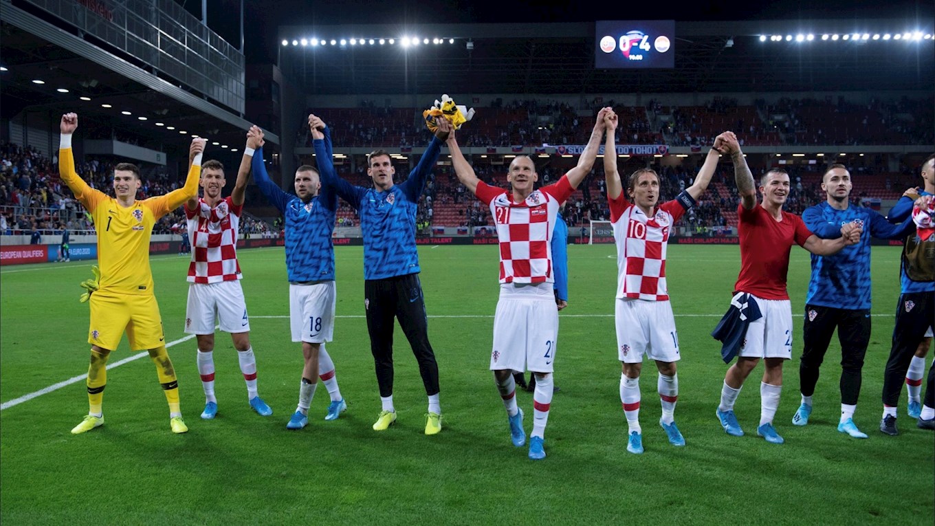 Simon Sluga joins his Croatia team-mates in celebrating their Euro 2020 qualifying win over Slovakia