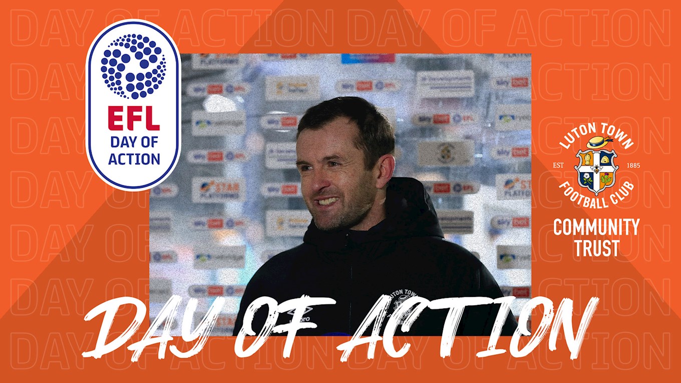 Hatters manager Nathan Jones pictured speaking to a TV reporter after a match