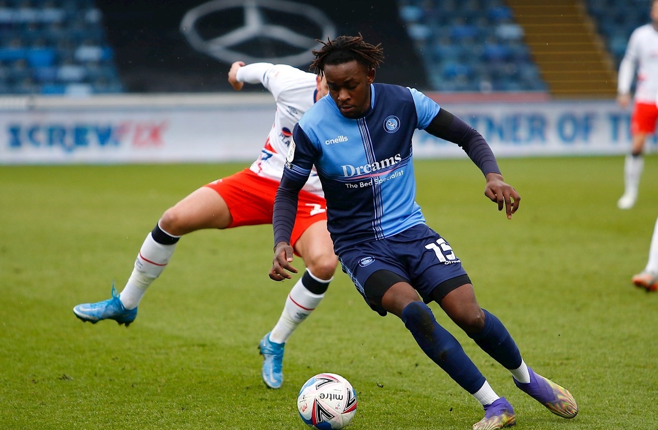 Admiral Muskwe in action for Wycombe against the Hatters at Adams Park in April