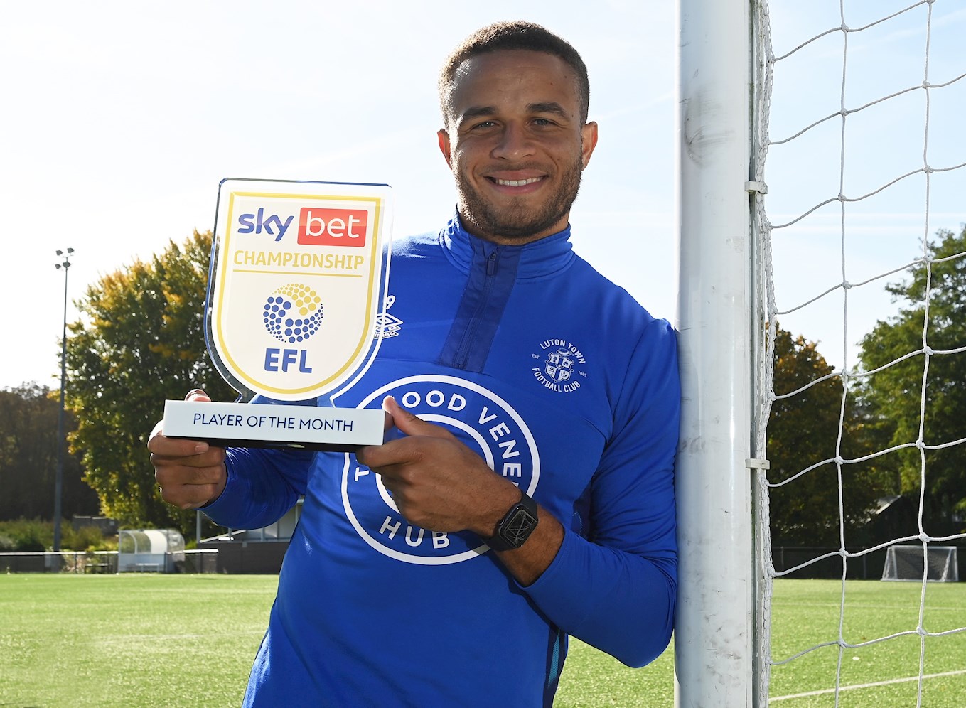 Carlton Morris pictured with his Sky Bet Championship Player of the Month award for September
