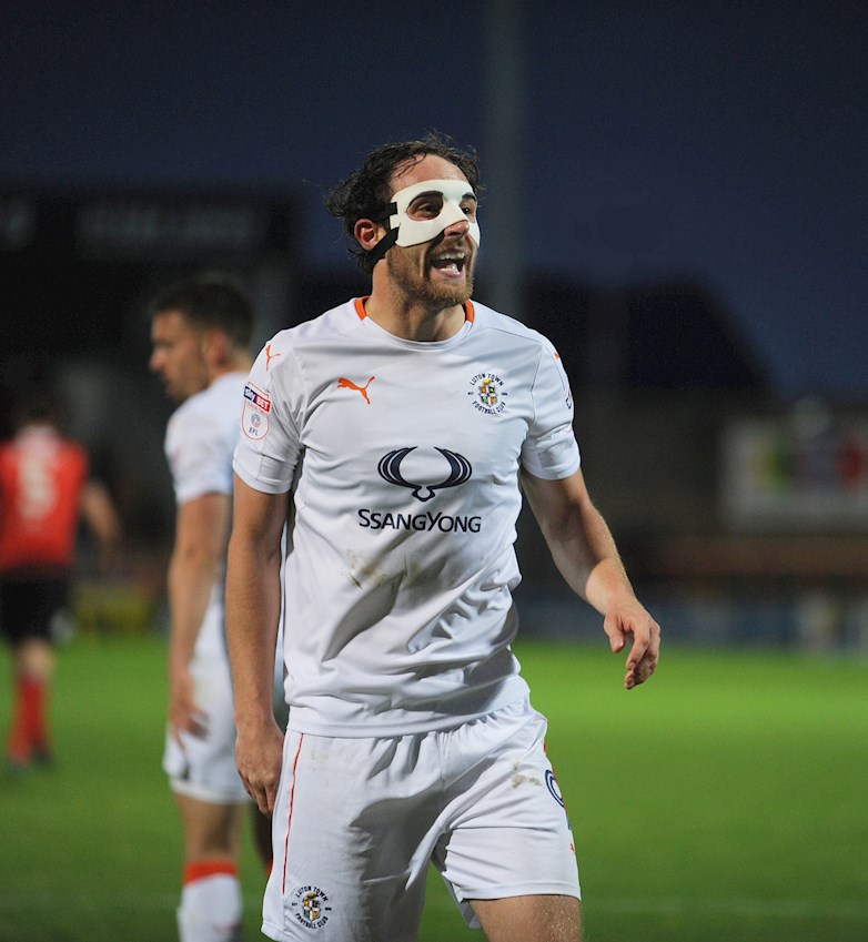 Danny Hylton playing in his mask to protect his broken cheekbone in the 2016-17 season
