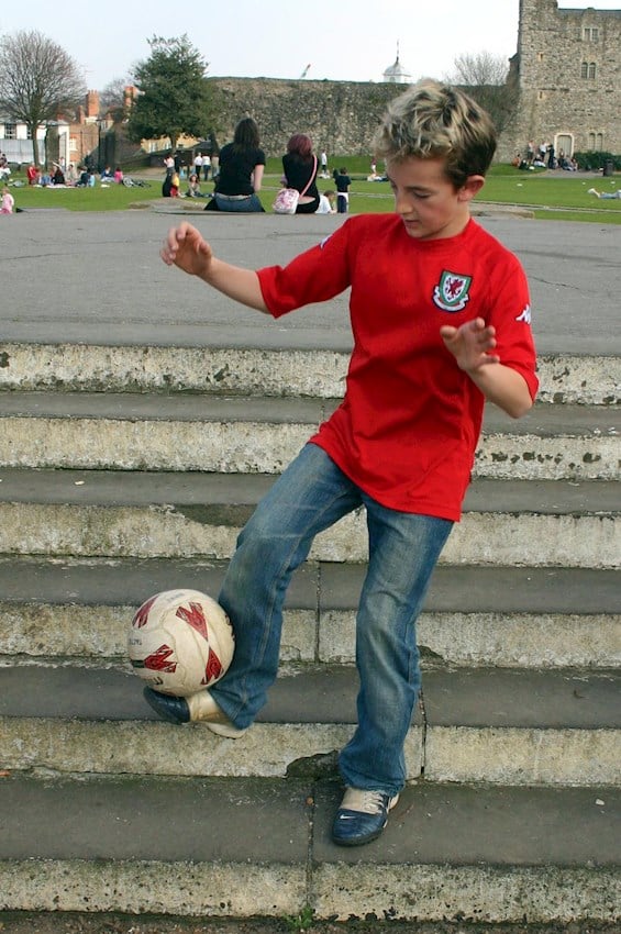 A young Tom Lockyer shows off his skills in a Wales shirt