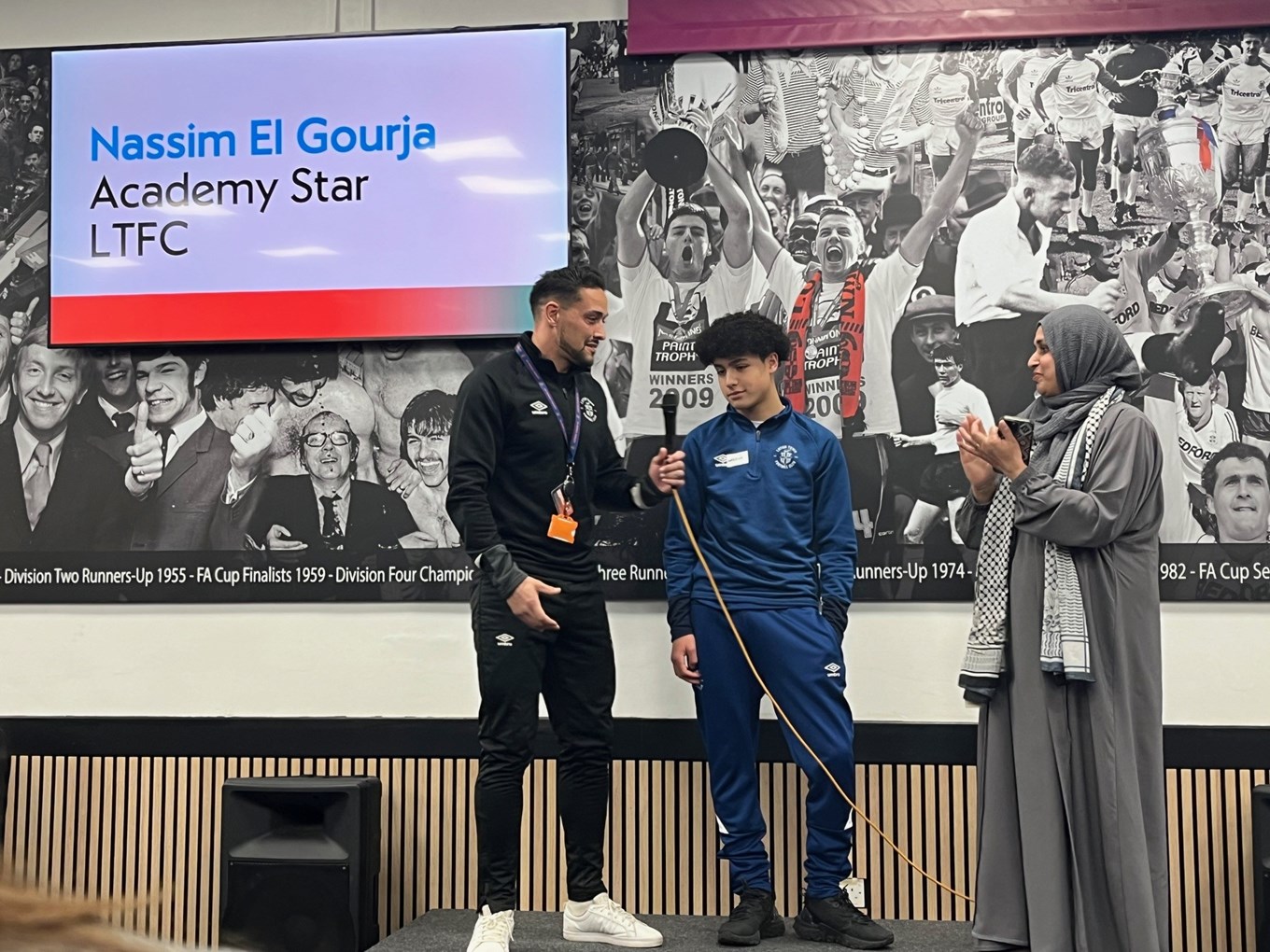 Hatters academy player Nassim speaks at the Unity Iftar 2024 event at Kenilworth Road