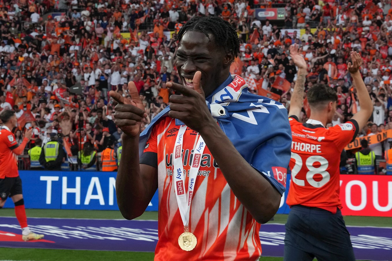 Elijah Adebayo celebrates play-off promotion at Wembley