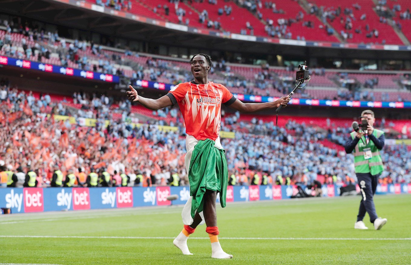 Elijah Adebayo celebrates the Championship play-off final win at Wembley