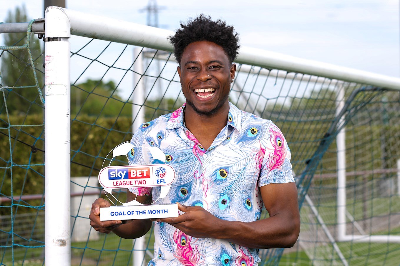Mpanzu with his League Two Goal of the Month award in 2018.